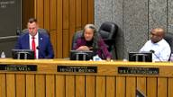 Shelby County Commissioner Henri E. Brooks speaking at the commission dais, seated between Commissioners Derek Mills and Will Richardson.
