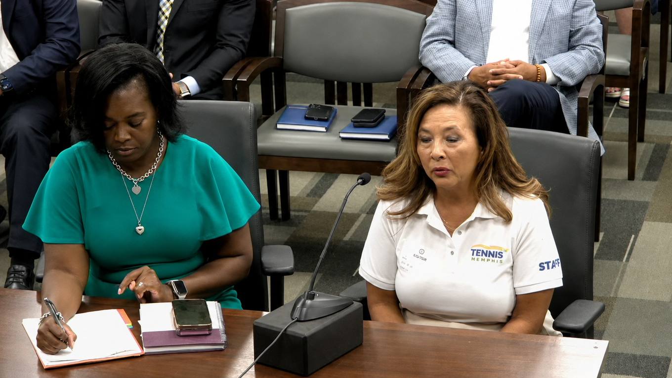 Two officials seated at a Memphis City Council committee table during the Bellevue Tennis Center update.