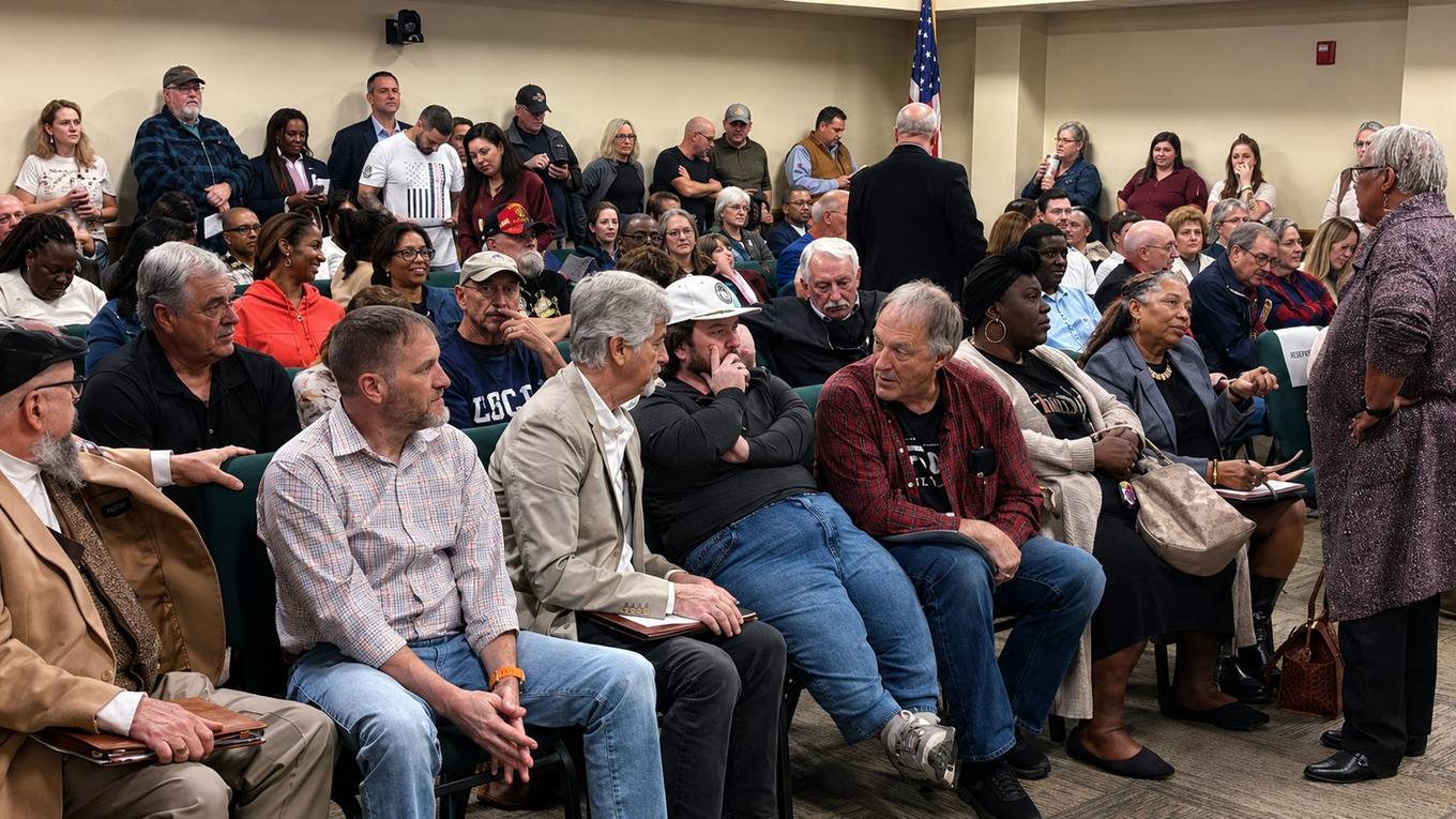 Residents fill the Columbia City Council chambers in Columbia, Tennessee, during a public meeting on proposed water-rate increases tied to the city's $520 million water infrastructure project.