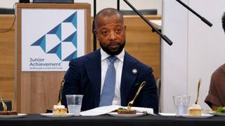 Shelby County Mayor-elect Mickell Lowery seated at a table during his One Shelby transition team meeting in Memphis.