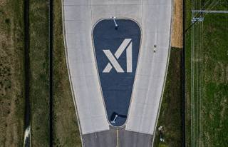 Aerial view of a paved access loop at the Memphis data center campus with the operator's logo painted on the roadway, near the properties named in the lien filings.
