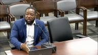 Augustine Boateng, Deputy Chief Information Officer for the City of Memphis Information Technology Division, speaks at a microphone before the Memphis City Council Budget Committee.