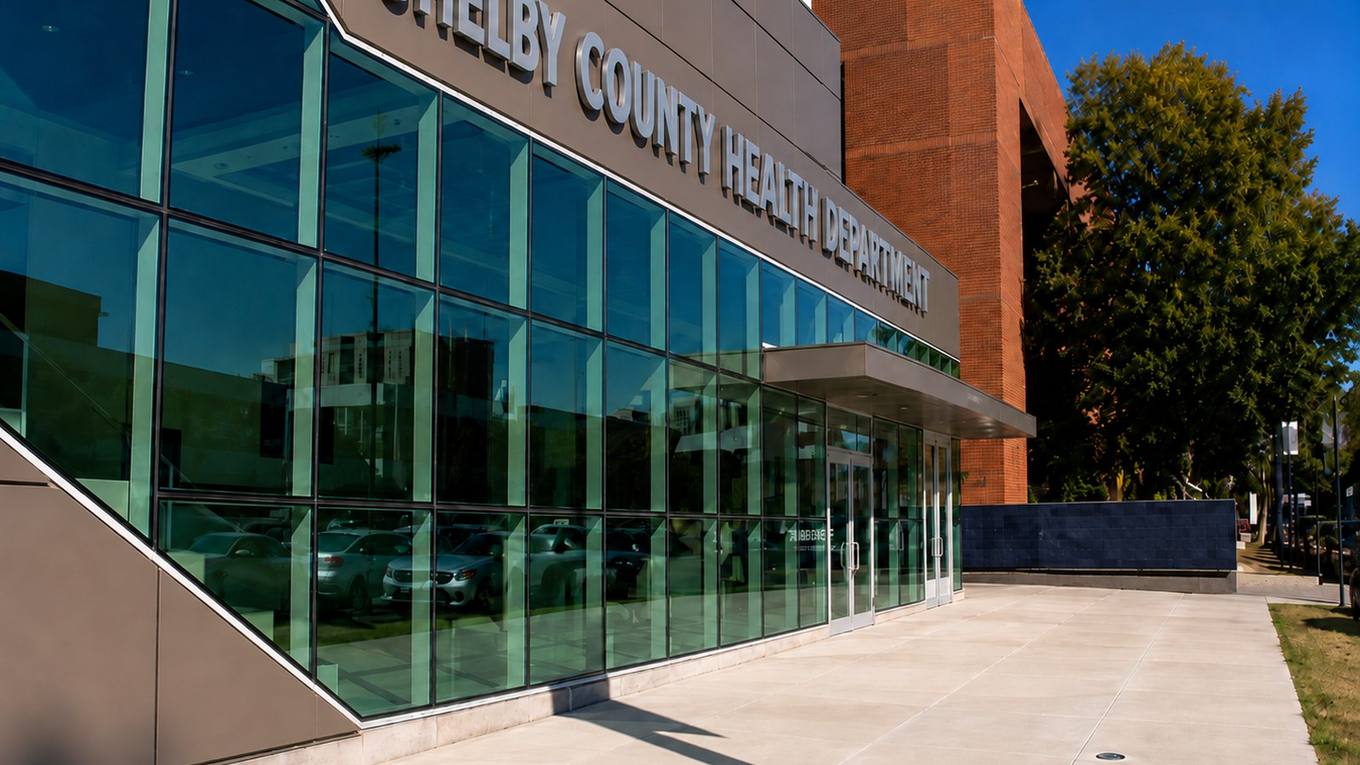 The exterior of the Shelby County Health Department building in downtown Memphis on a clear summer day.