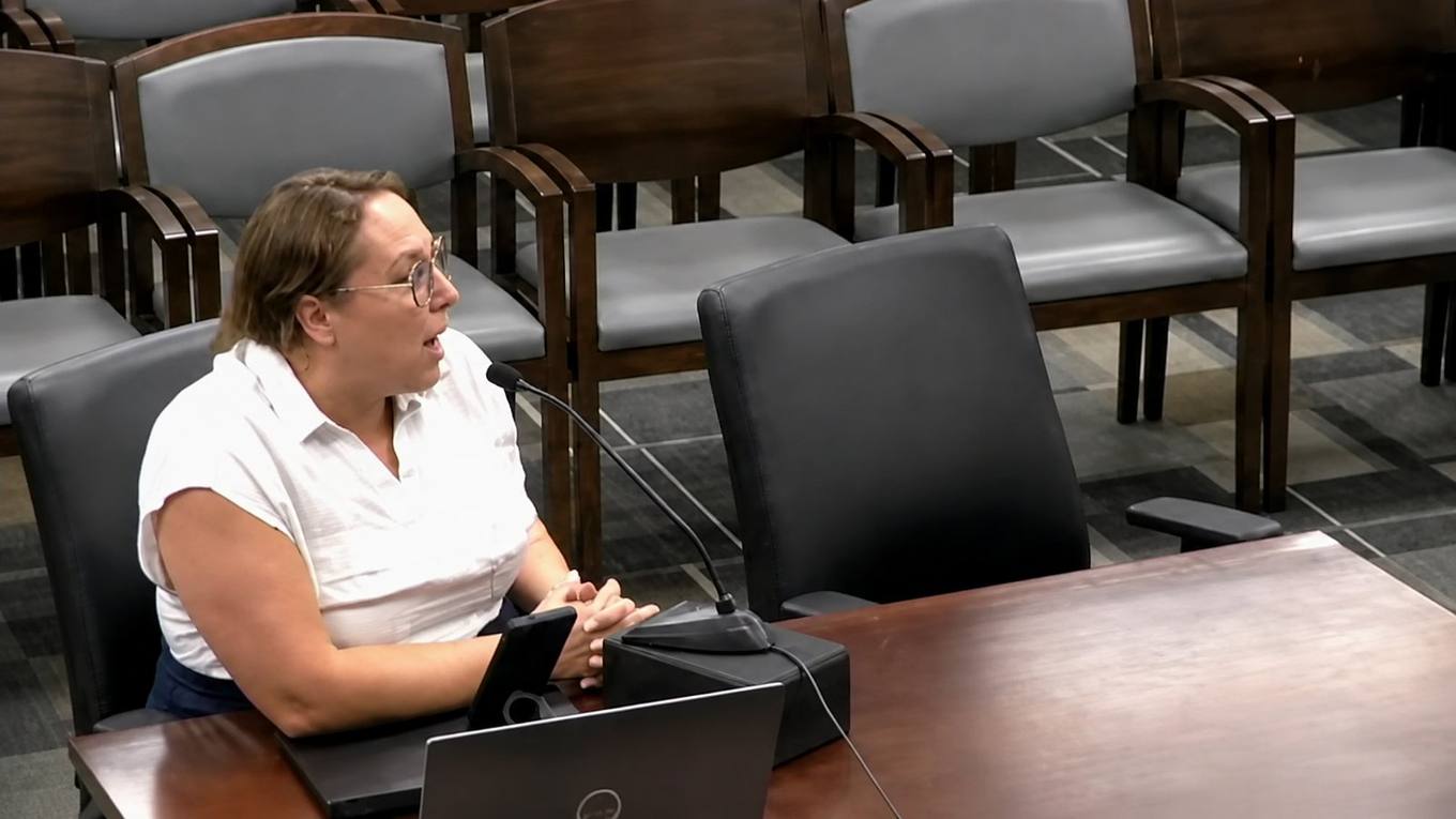 Courtney Werpy Story, Vice President of Government Initiatives at Undue Medical Debt, addresses the Memphis City Council during an Aug. 18, 2026 committee meeting about the city's medical debt relief program.