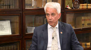 Shelby County District Attorney Steven Mulroy speaks during an interview in his office