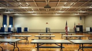 An empty polling place with voting booths