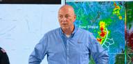 Doug McGowen, President and CEO of Memphis Light, Gas and Water, speaks in front of radar screens during a storm update briefing.