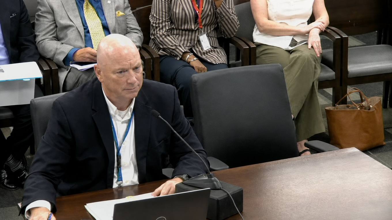 MLGW President and CEO Doug McGowen speaks at a Memphis City Council committee table.