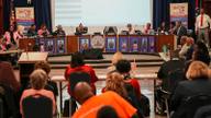 Memphis-Shelby County Schools board members seated at a curved dais during a public meeting, with an audience seated in rows in the foreground.