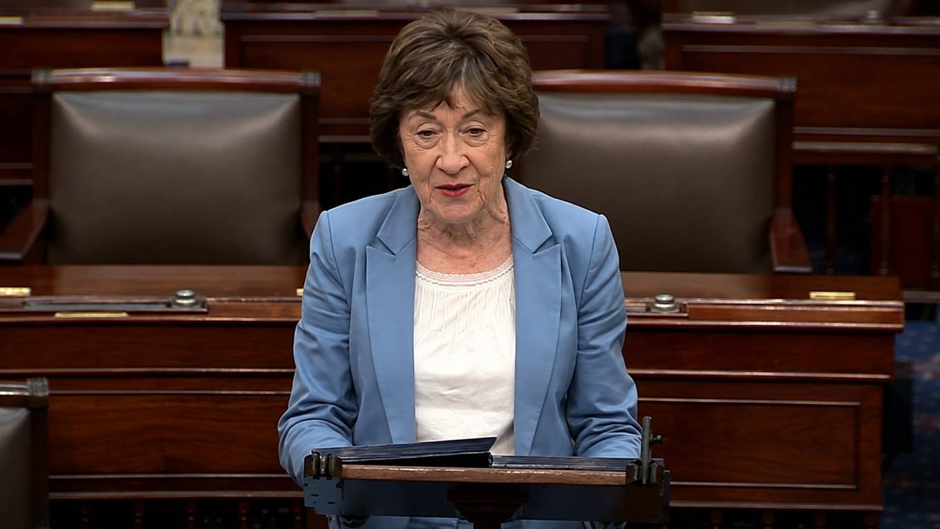 U.S. Senator Susan Collins of Maine speaks from a lectern on the Senate floor.