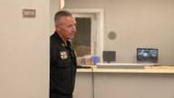 Senatobia Police Chief Harold Vanderford standing in a hallway outside the city board room.