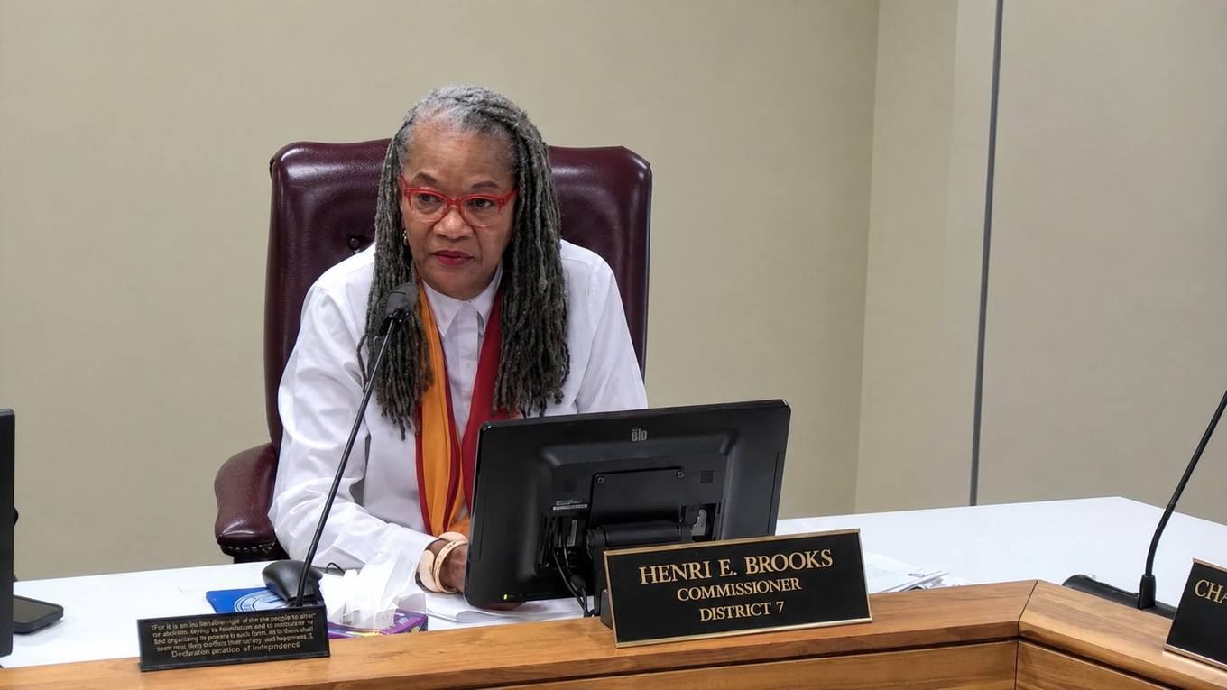 Shelby County Commissioner Henri E. Brooks, District 7, questions why no administration or Land Bank representative was present to explain a proposed lease extension during a commission committee meeting.