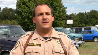 Millington Police Lieutenant Bryan Childress in uniform during an outdoor interview.