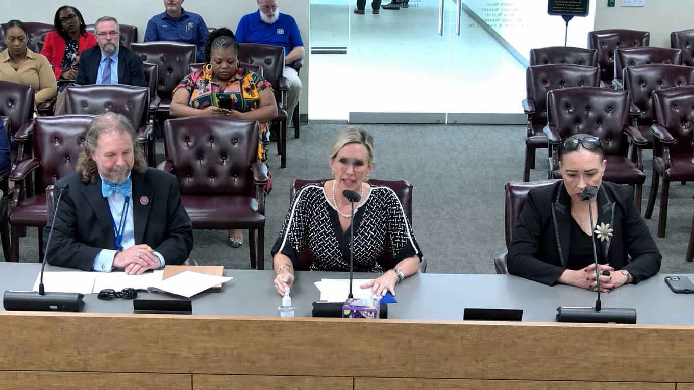 Brian Harter, Director of Finance for the Shelby County Criminal Court Clerk's Office, and then-Criminal Court Clerk Heidi Kuhn address Shelby County commissioners about funding for two newly mandated Criminal Court divisions.