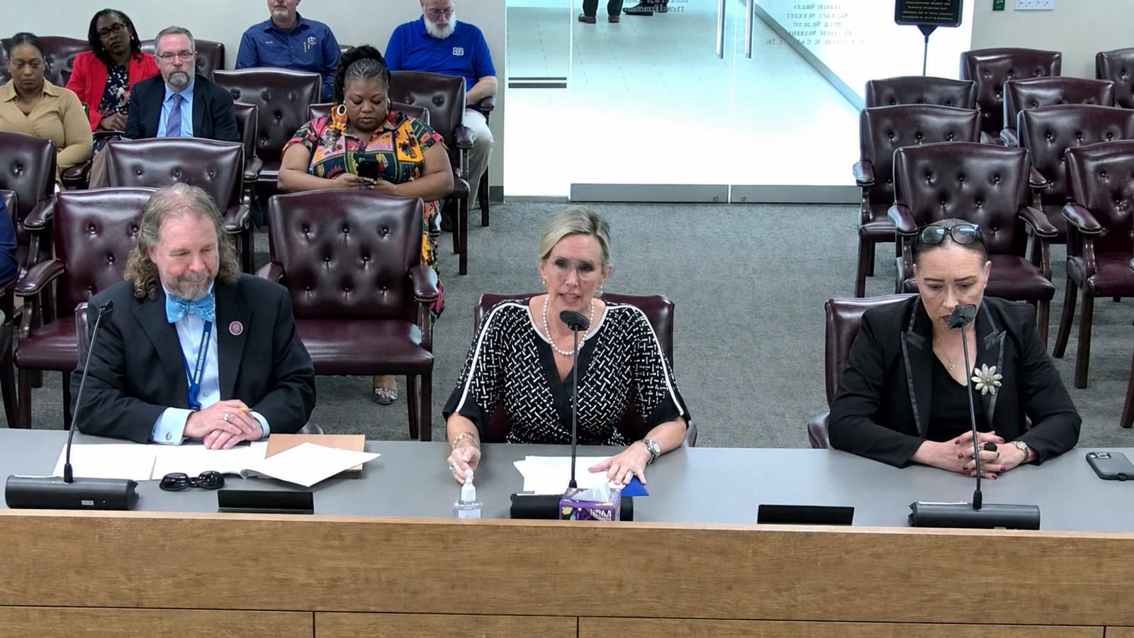 Brian Harter, Director of Finance for the Shelby County Criminal Court Clerk's Office, and then-Criminal Court Clerk Heidi Kuhn address Shelby County commissioners about funding for two newly mandated Criminal Court divisions.