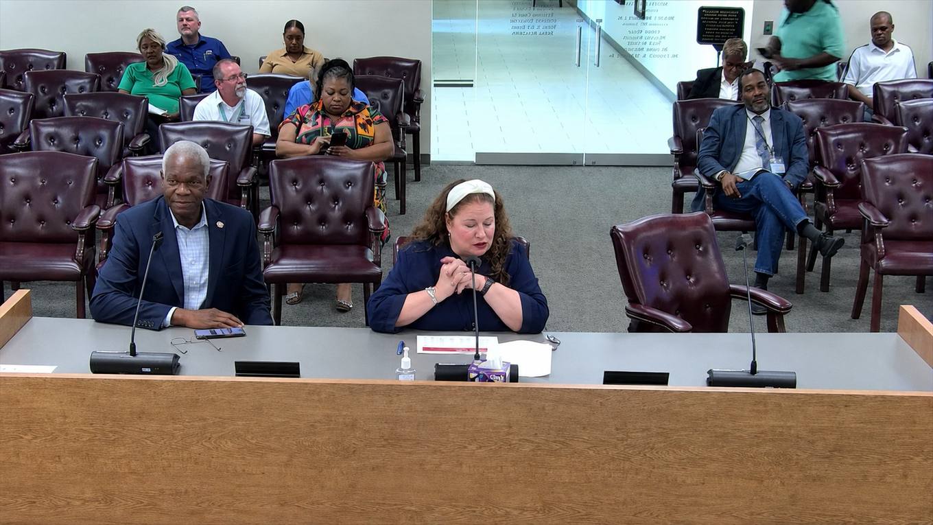 Then-Shelby County Trustee Regina Morrison Newman presents the county's FY2026 fourth-quarter financial report to commissioners at the committee dais, reporting a record $49.9 million in investment income.