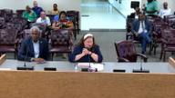 Then-Shelby County Trustee Regina Morrison Newman presents the county's FY2026 fourth-quarter financial report to commissioners at the committee dais, reporting a record $49.9 million in investment income.