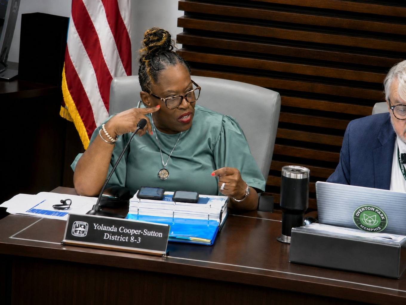 Memphis City Council member Yolanda Cooper-Sutton speaks into a microphone at the council dais, pointing while questioning officials during a committee session.