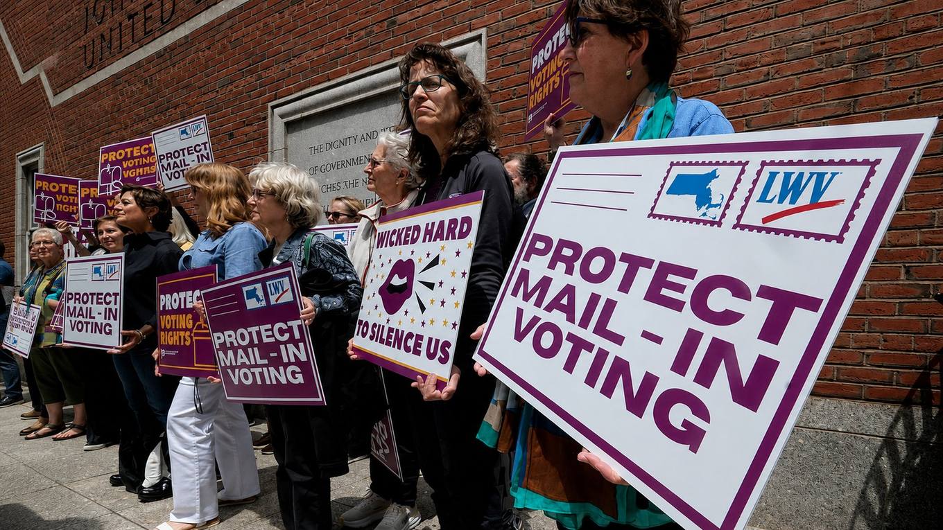 Supporters gather outside the federal courthouse in Boston on June 2, 2026, following a hearing in a lawsuit brought by a coalition of Democratic state attorneys general challenging President Donald Trump's executive order tightening rules on mail-in voting.
